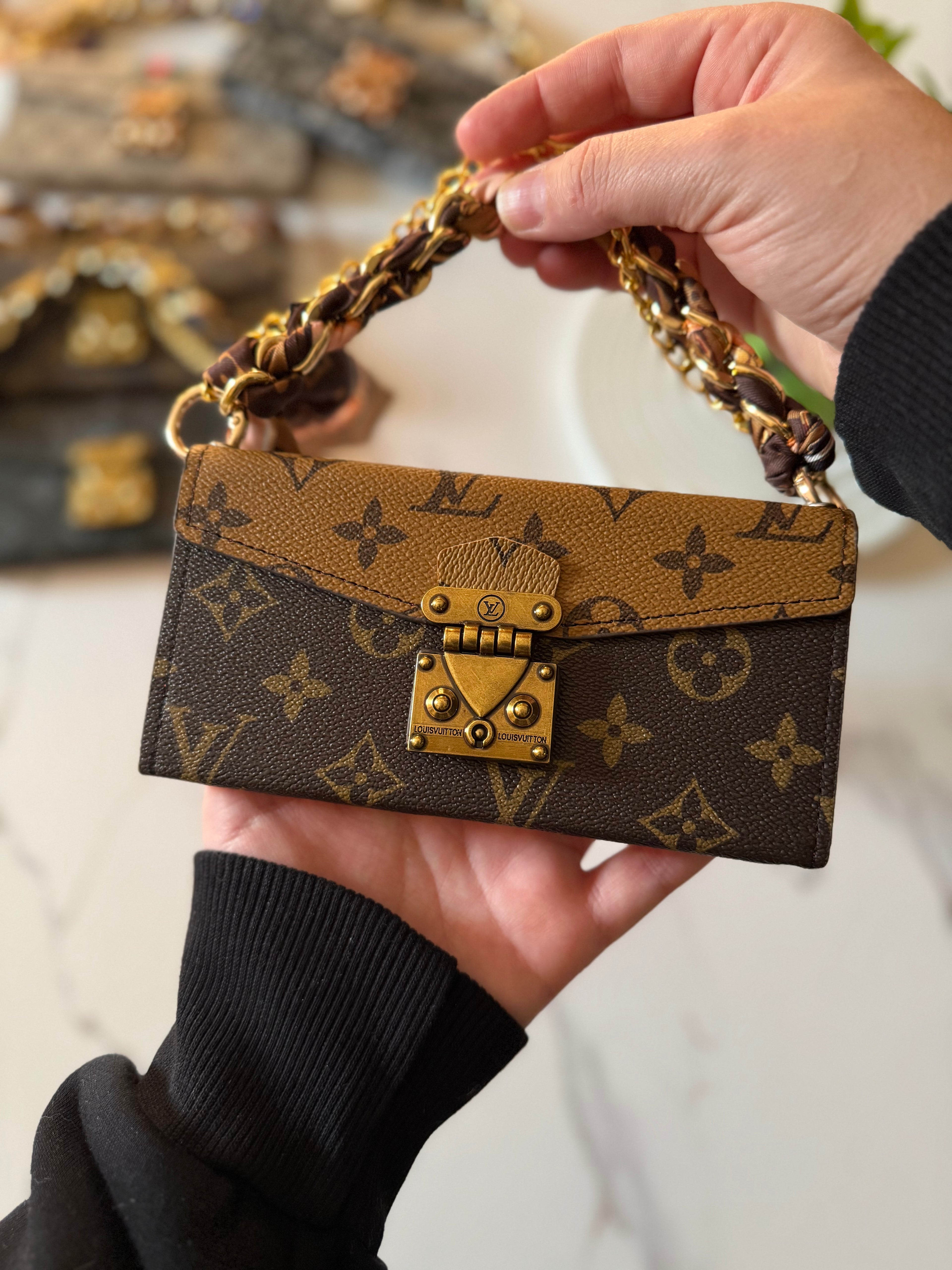 A luxury designer phone case featuring