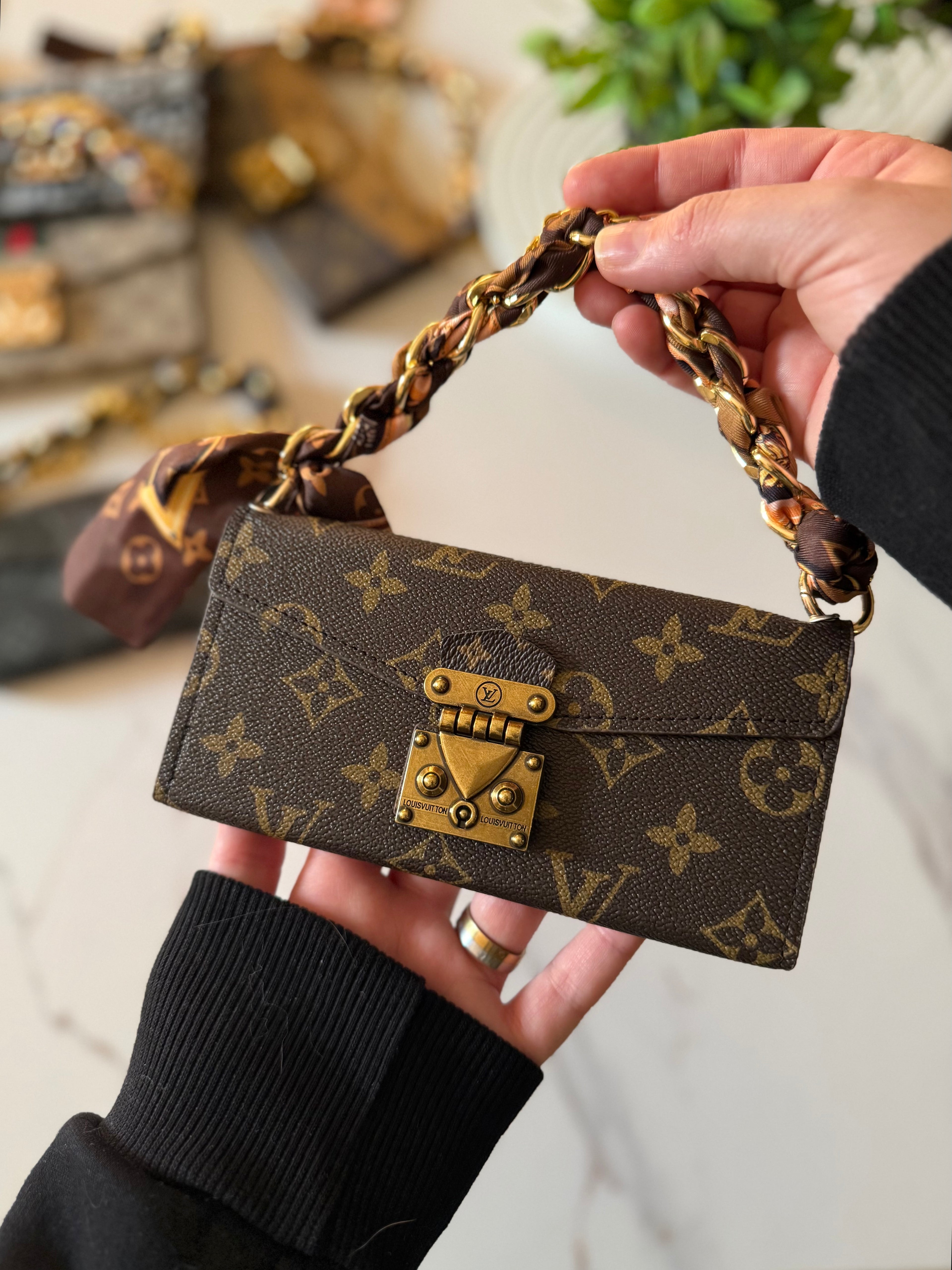 A luxury designer phone case featuring