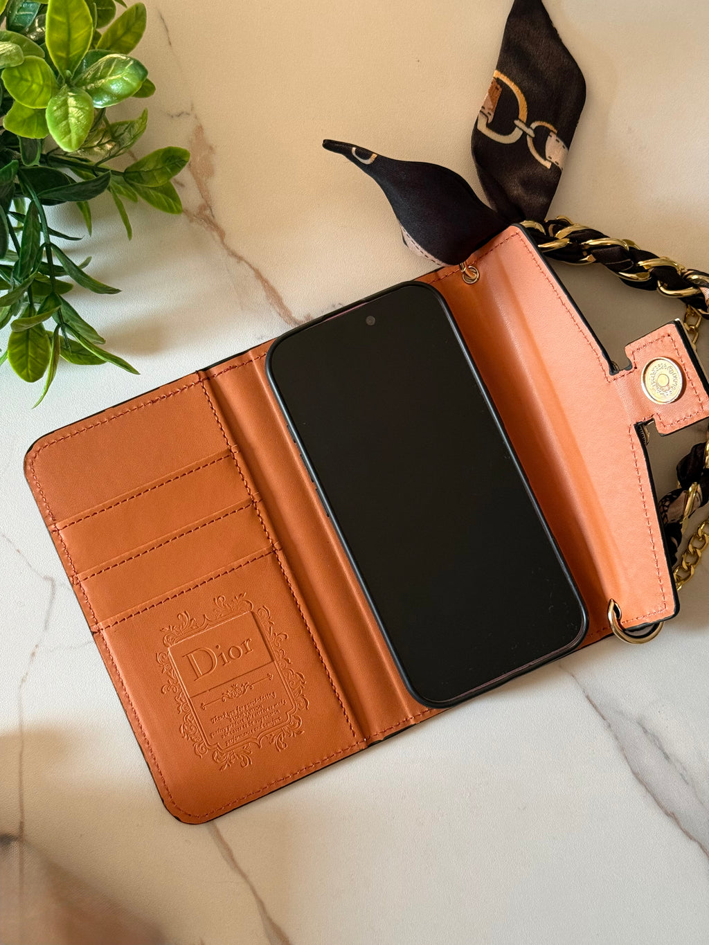 A luxury designer phone case featuring