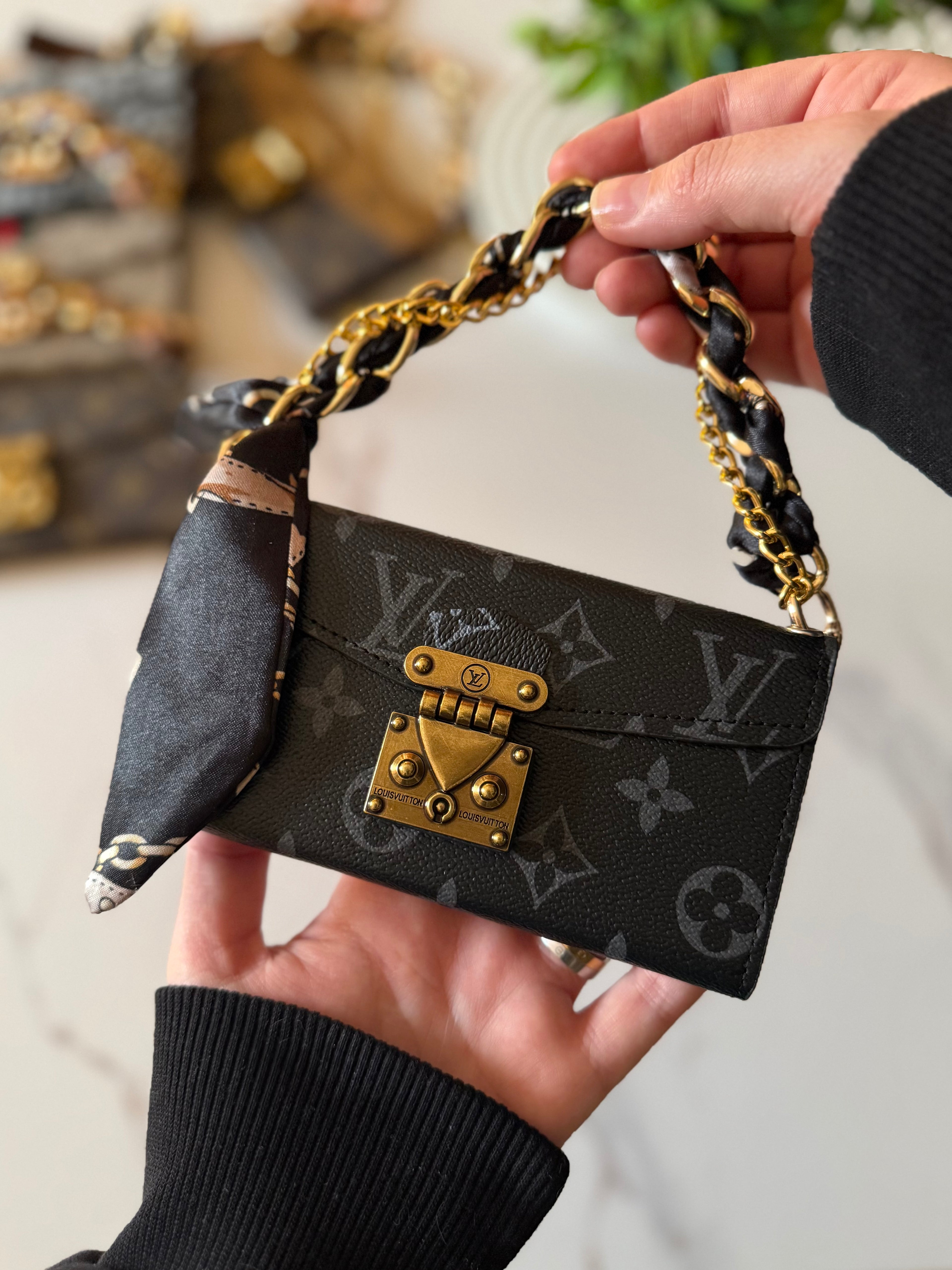 A luxury designer phone case featuring