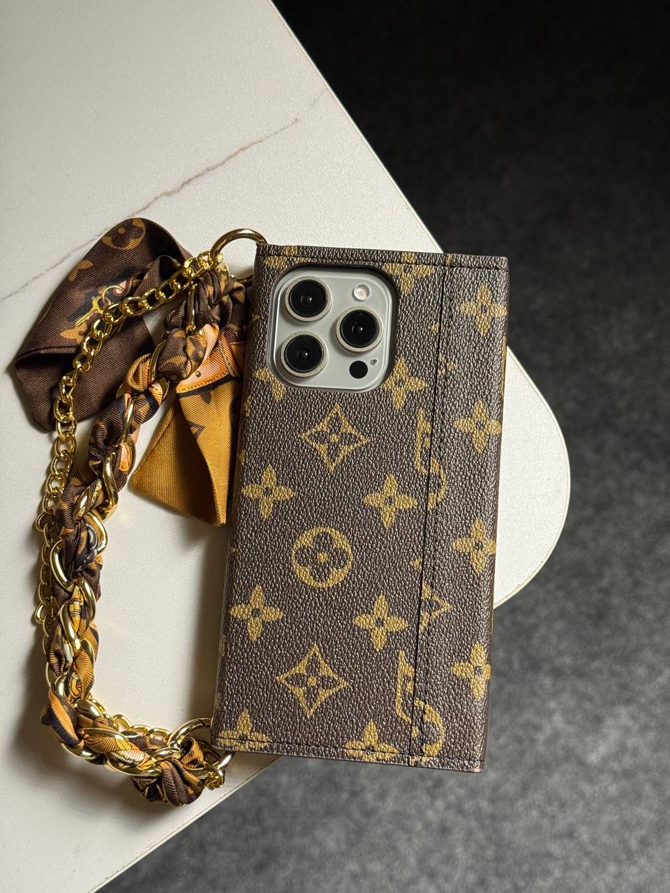 A luxury designer phone case featuring