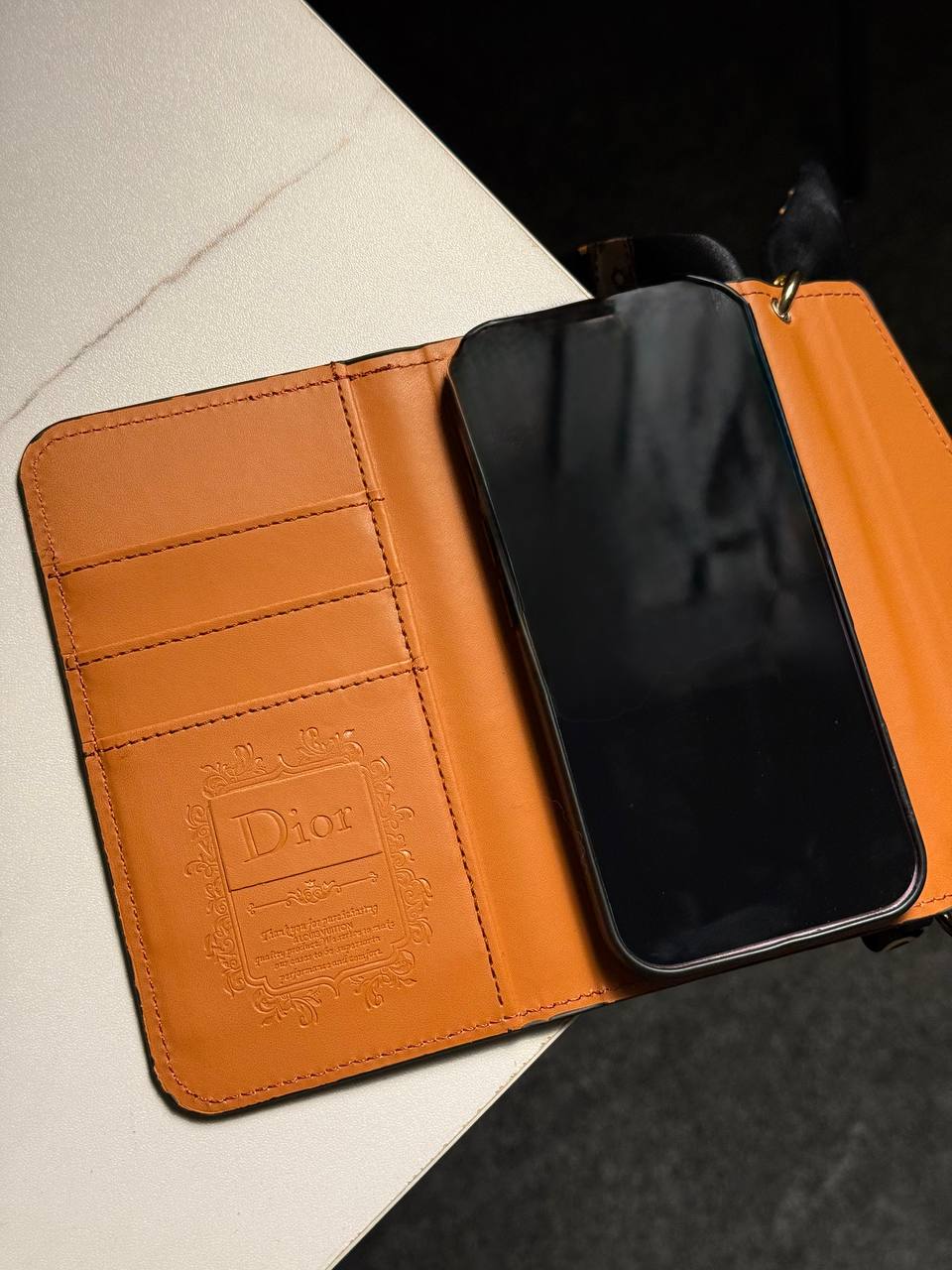 A luxury designer phone case featuring