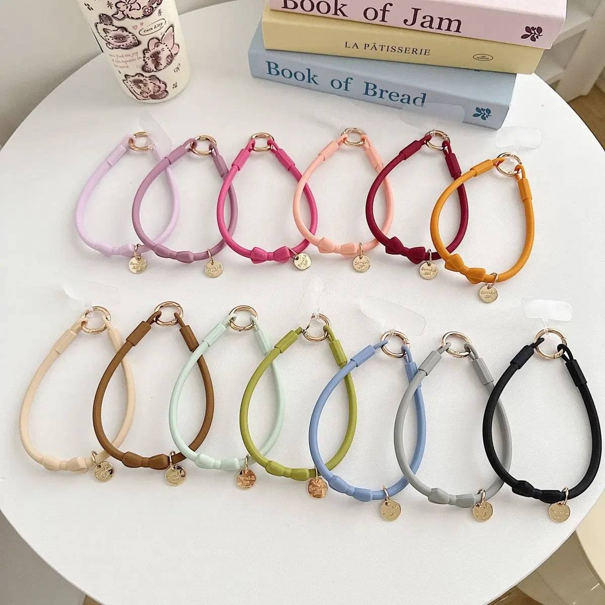 Minimalist Phone Strap Wristlet Collection with Gold Coin Charm