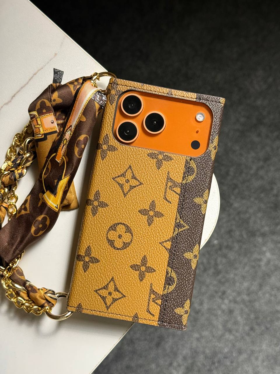 A luxury designer phone case featuring