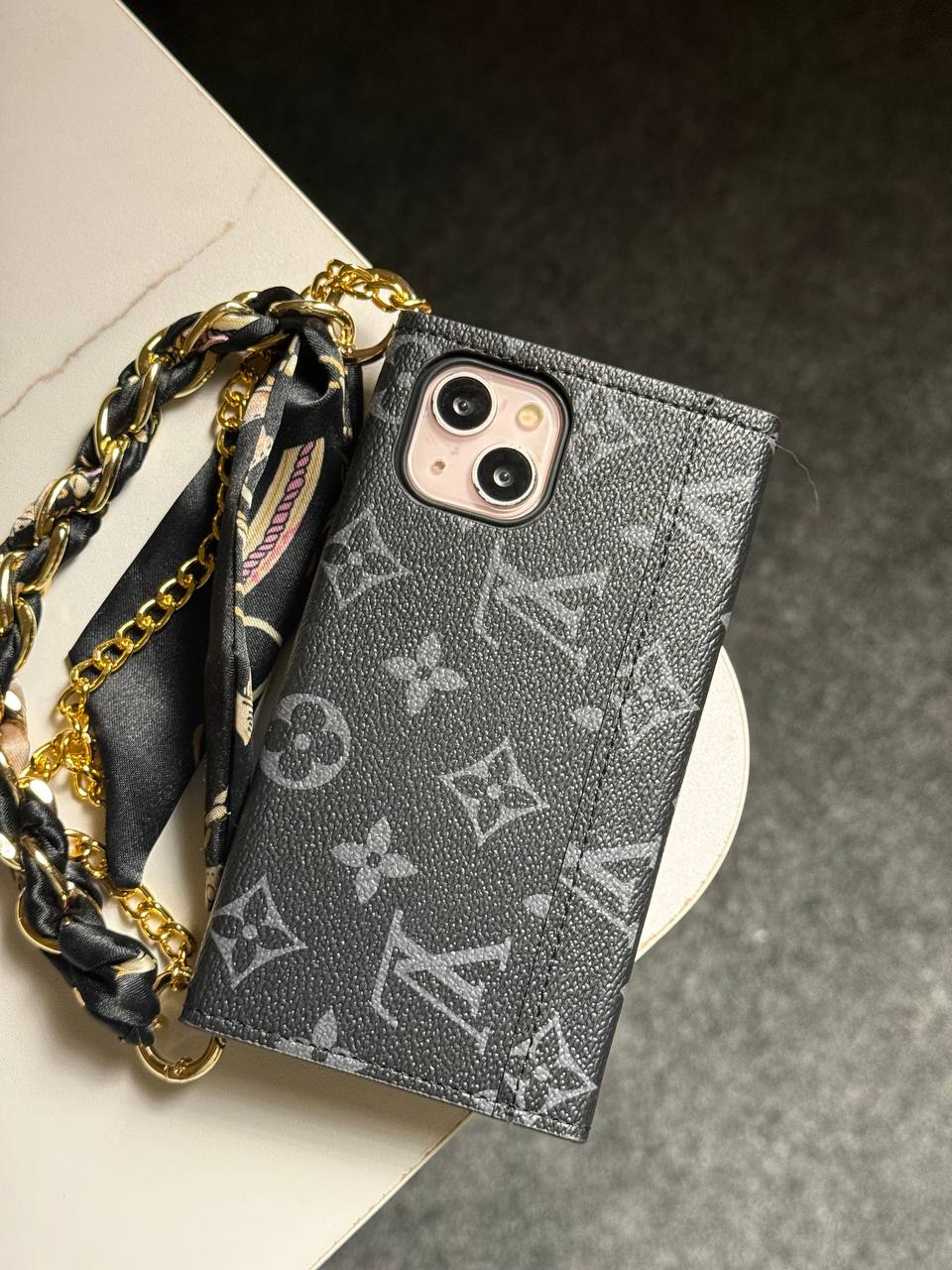 A luxury designer phone case featuring